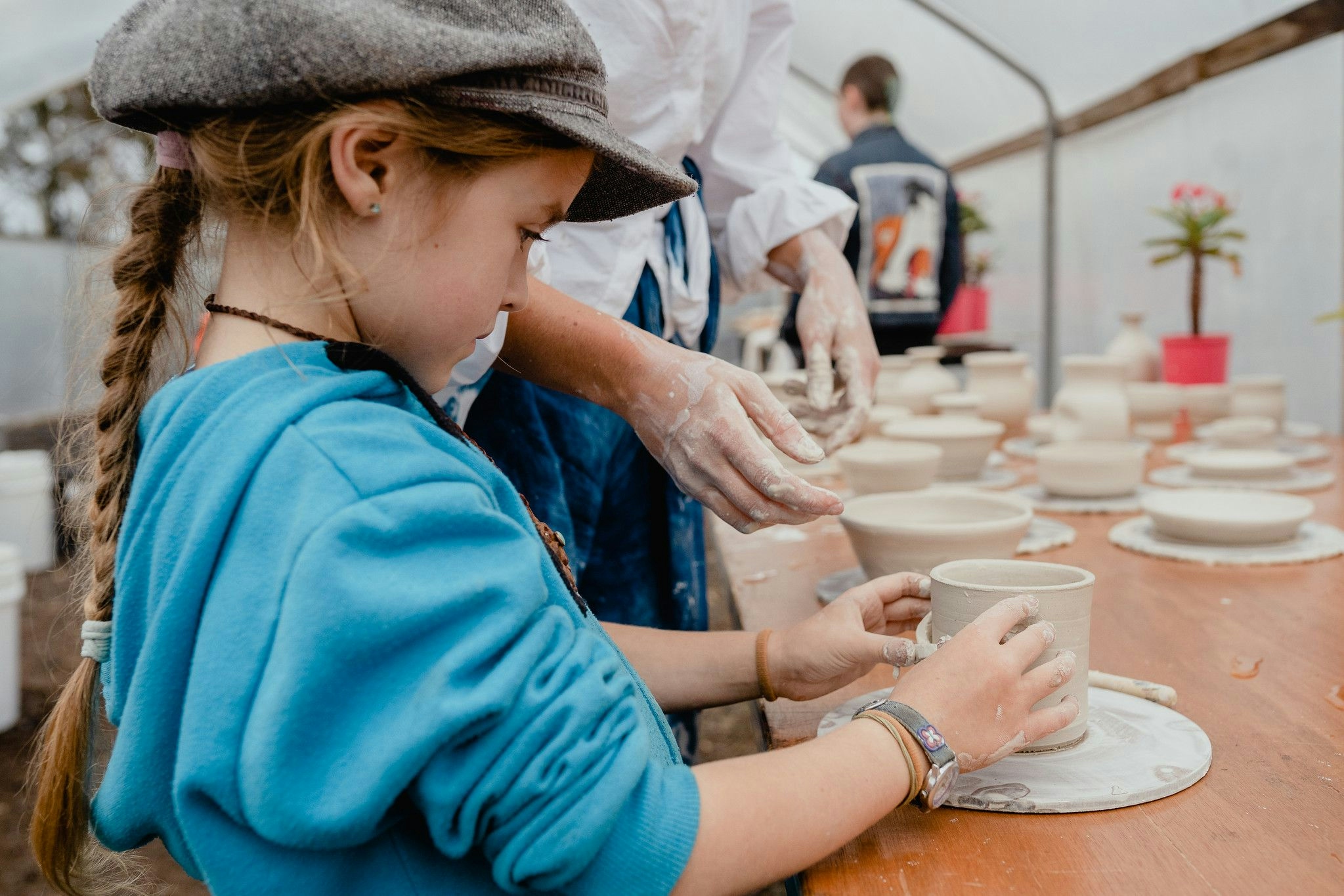 Child making pottery