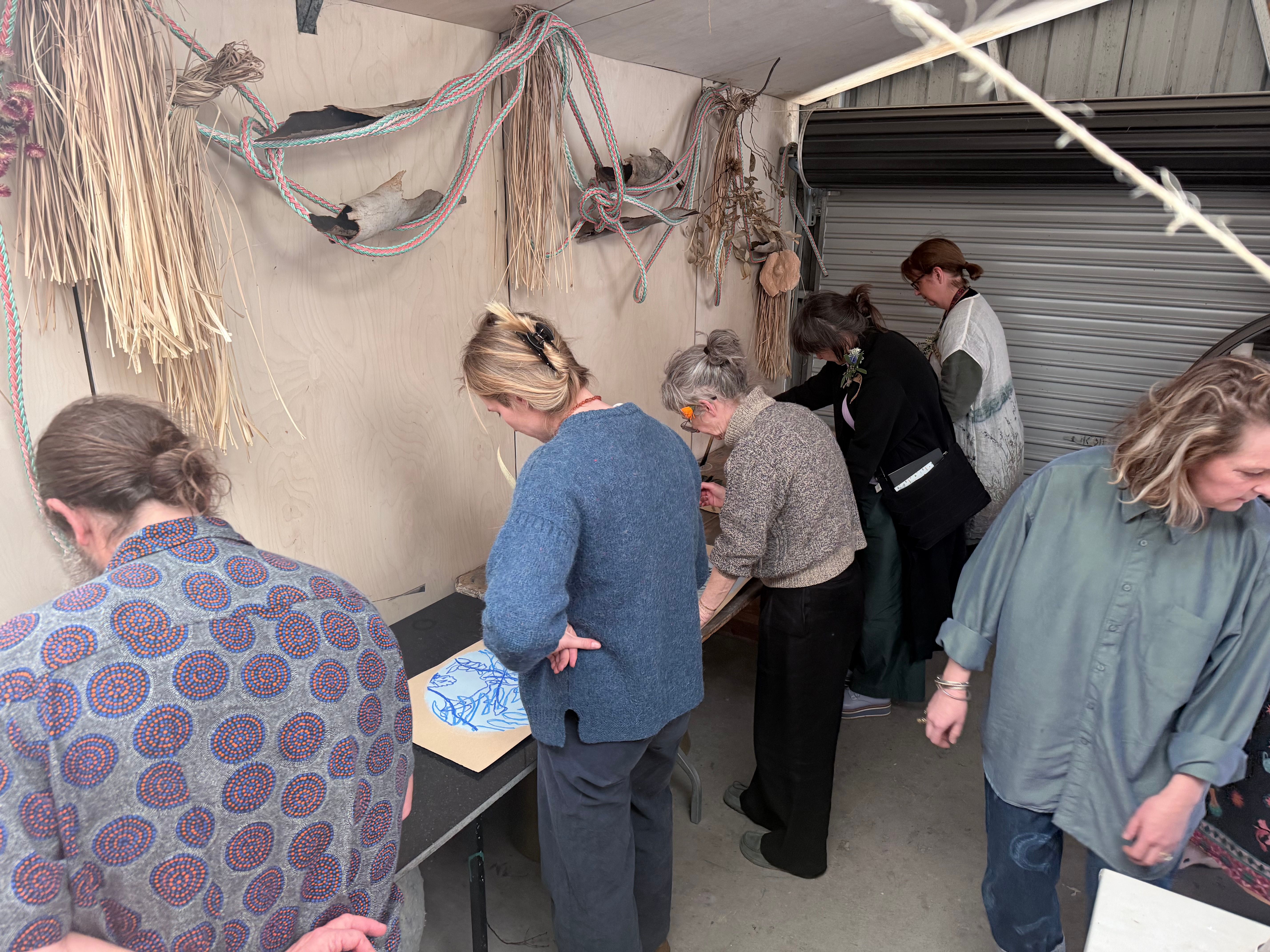 people doing art in the art studio