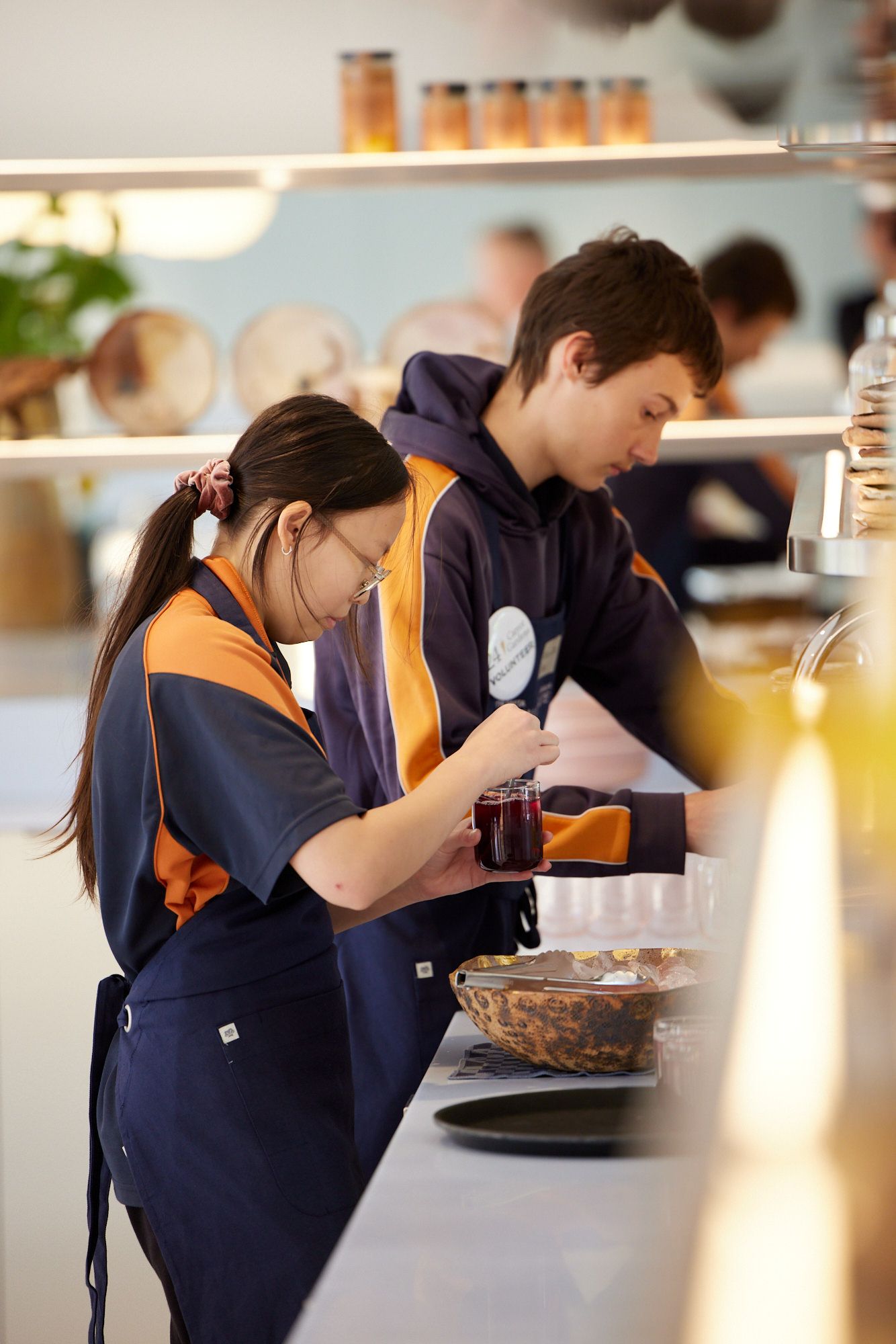 Two students making lunch in our kitchen