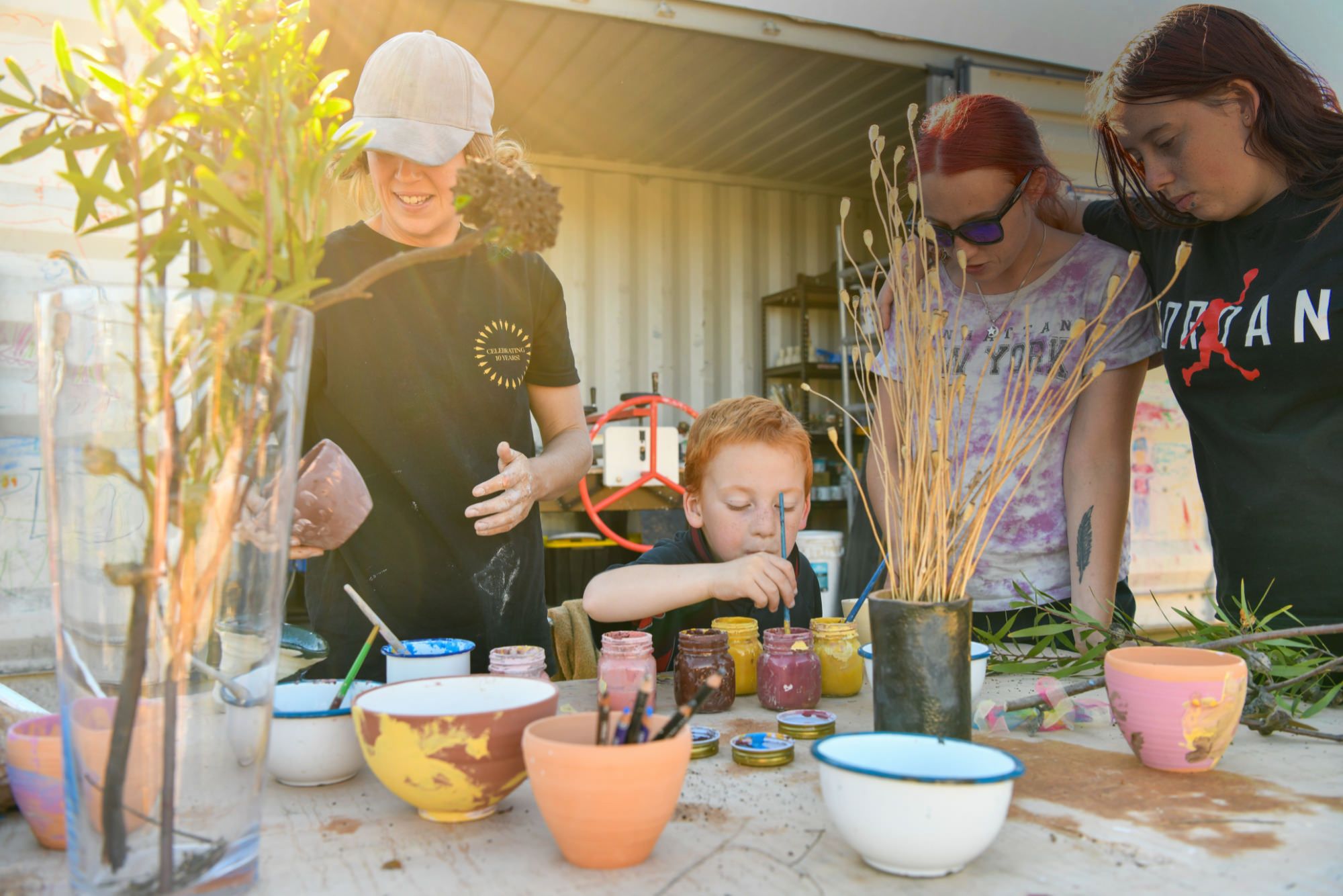 Kids at bond place learning ceramics