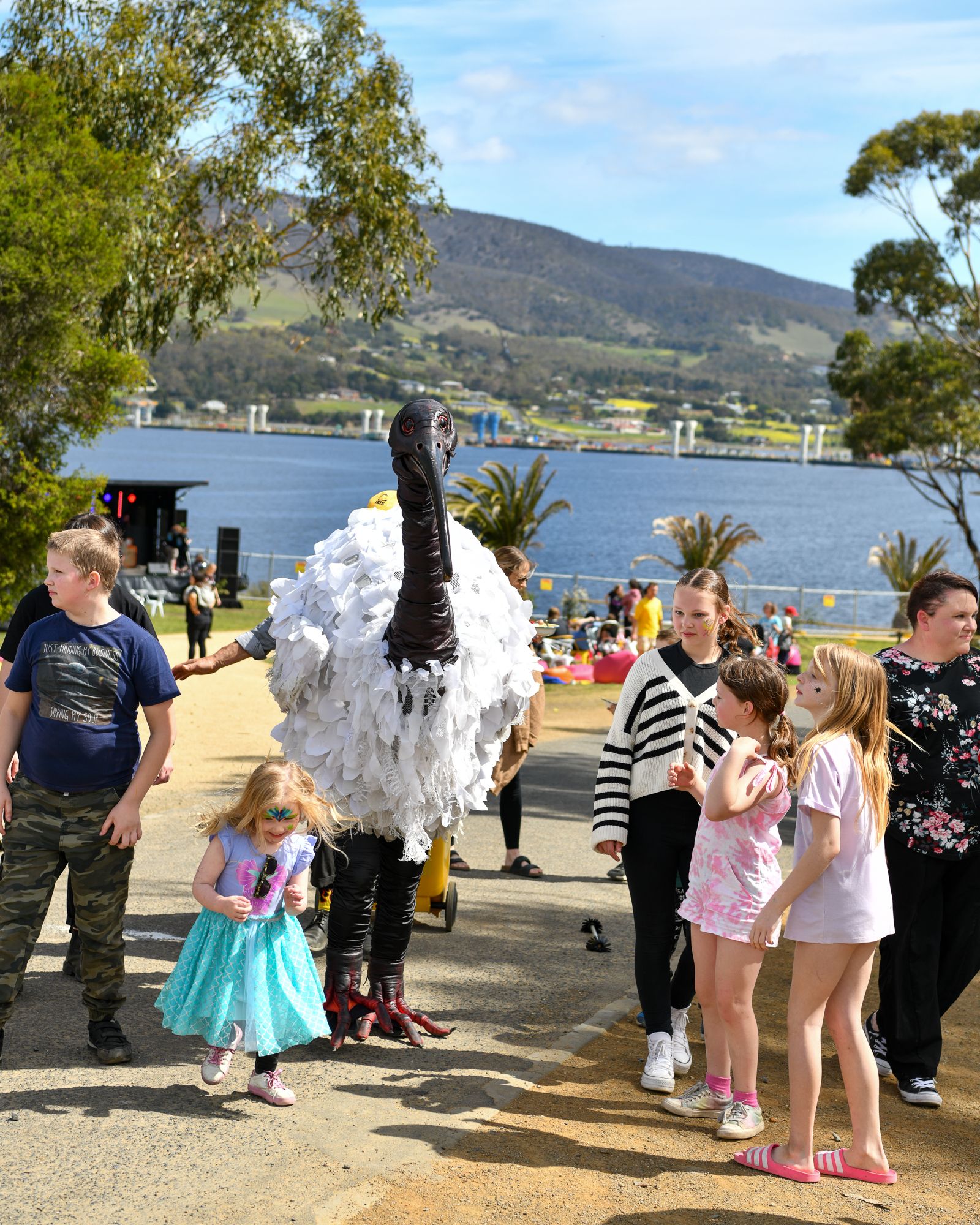 bin chicken puppet with kids at Springfest