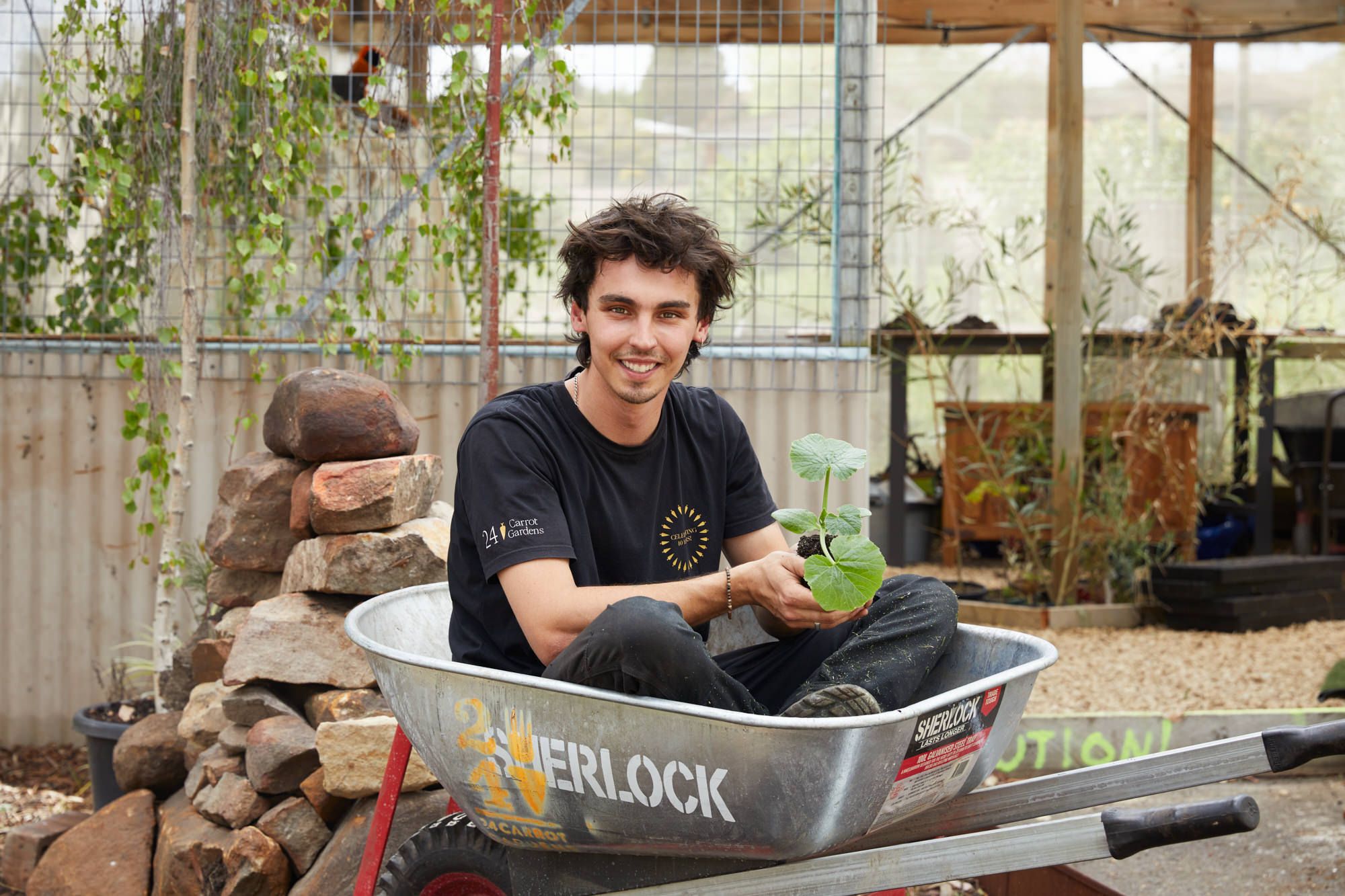 Connor in wheelbarrow