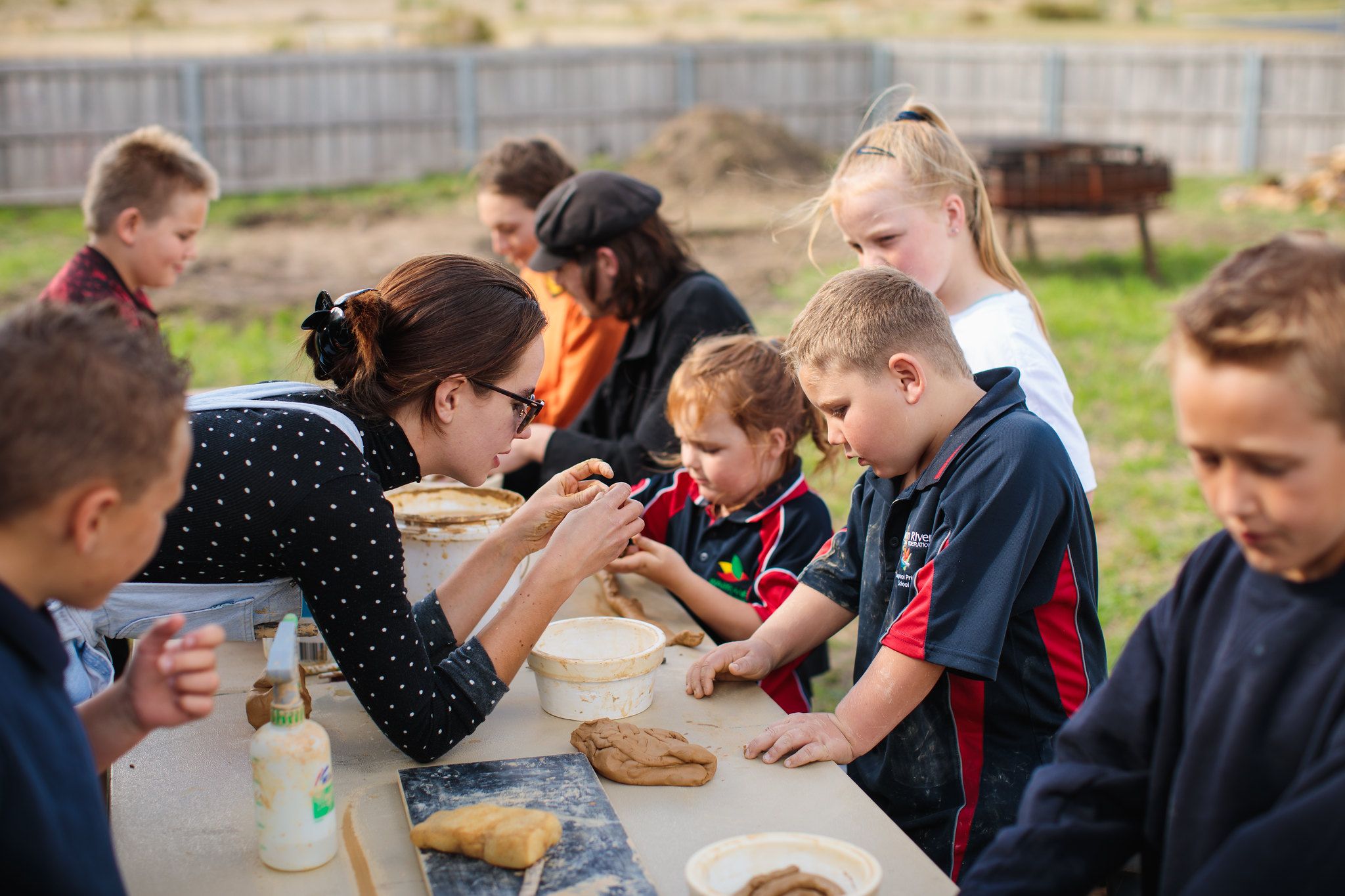 Kids at bond place learning ceramics