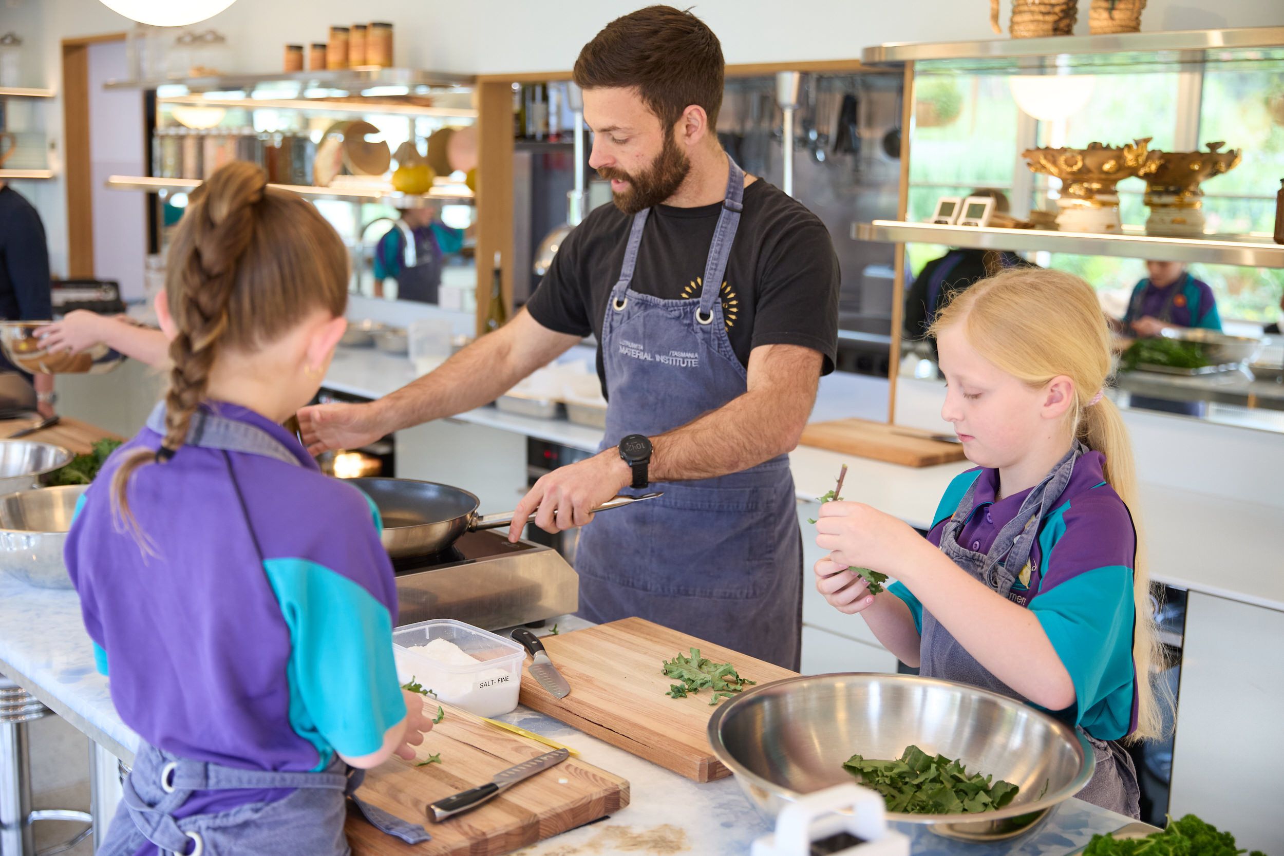 students cooking in the kitchen